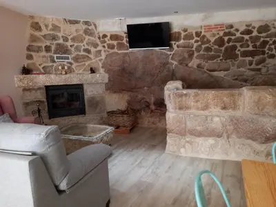 Una televisión o centro de entretenimiento en La Lagareta de Olivia
