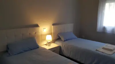 Cama o camas de una habitación en GS ALCÁZAR