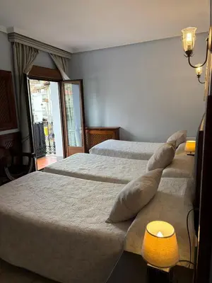 Cama o camas de una habitación en Hostal Cerezo 2