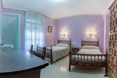 Cama o camas de una habitación en Pensión Virginia by Vivere Stays