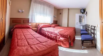 Cama o camas de una habitación en Pensión Isabel by Vivere Stays