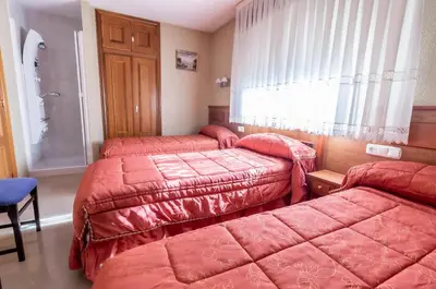 Cama o camas de una habitación en Pensión Isabel by Vivere Stays
