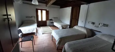 Cama o camas de una habitación en Albergue San Blas - Vía de la Plata y Cáparra - Vía Verde