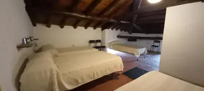 Cama o camas de una habitación en Albergue San Blas - Vía de la Plata y Cáparra - Vía Verde