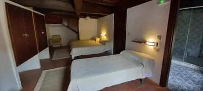Cama o camas de una habitación en Albergue San Blas - Vía de la Plata y Cáparra - Vía Verde
