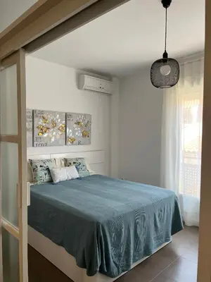 Cama o camas de una habitación en Apartamento JALAMA 1C