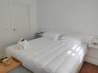 Cama o camas de una habitación en Apartamentos R66
