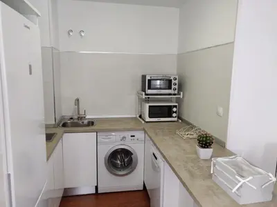 Una cocina o zona de cocina en Apartamentos R66