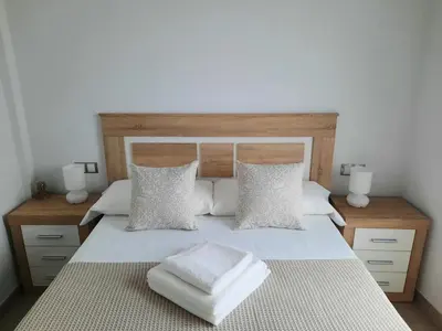 Cama o camas de una habitación en Apartamentos Clavero 10