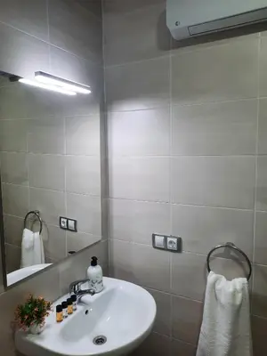 Un baño de Apartamentos Clavero 10