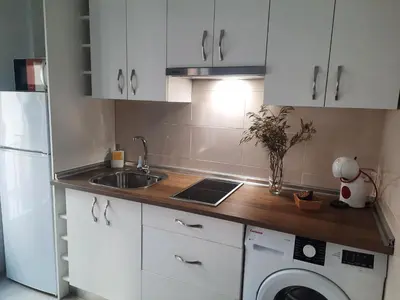 Una cocina o zona de cocina en Apartamentos Clavero 10