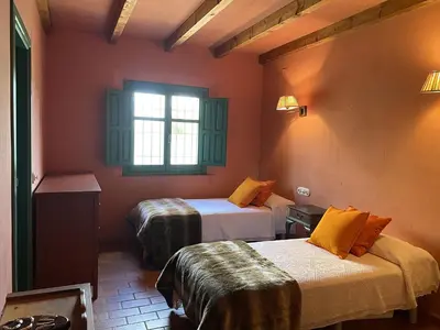 Cama o camas de una habitación en EL BAUZAL DE TRUJILLO