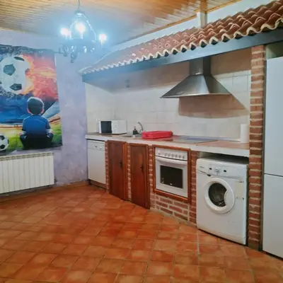 Una cocina o zona de cocina en Don Mauricio y periquines
