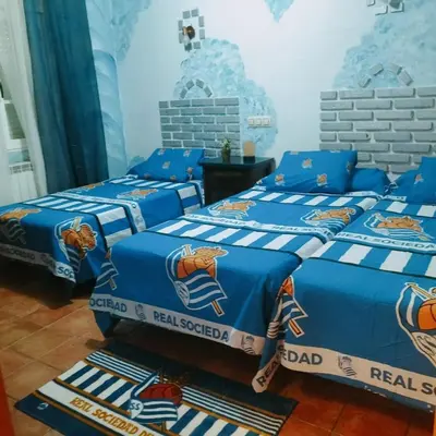 Cama o camas de una habitación en Don Mauricio y periquines