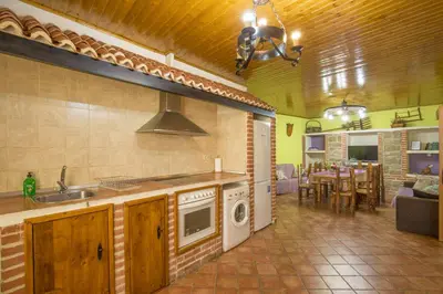 Una cocina o zona de cocina en Don Mauricio y periquines