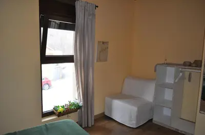 Cama o camas de una habitación en El Rincón Secreto de Gredos especializada en celiaquía y diabetes y jacuzzi