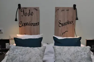 Cama o camas de una habitación en El Rincón Secreto de Gredos especializada en celiaquía y diabetes y jacuzzi