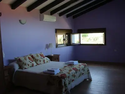 Cama o camas de una habitación en Casas Rurales Manolo