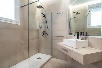 Un baño de CMDreams Gold- Apartamentos turísticos con ruinas romanas en el centro de Mérida