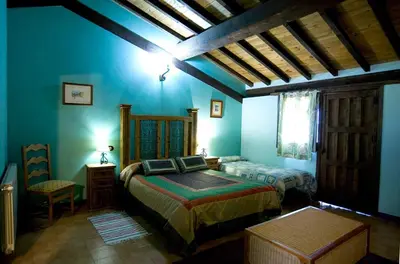 Cama o camas de una habitación en Casa Rural - Apartamentos Atuvera