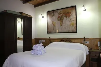 Cama o camas de una habitación en Casa Rural - Apartamentos Atuvera