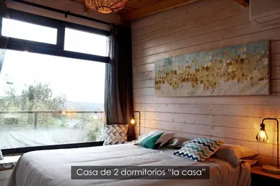 Cama o camas de una habitación en NidoGredos Cabañas Ecológicas de Diseño
