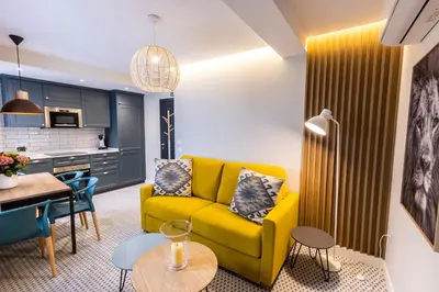 Zona de estar de Apartamentos El Patio - Modernos con vistas en Plaza Mayor