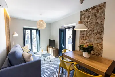 Zona de estar de Apartamentos El Patio - Modernos con vistas en Plaza Mayor
