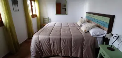 Cama o camas de una habitación en Pago de Yuste - Casa Rural Apartamentos