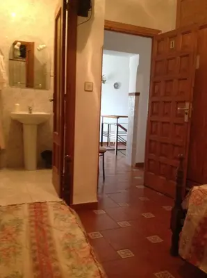 Cama o camas de una habitación en Mesón de Lagartera