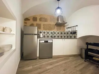 Una cocina o zona de cocina en Torre del Postigo By KubiK