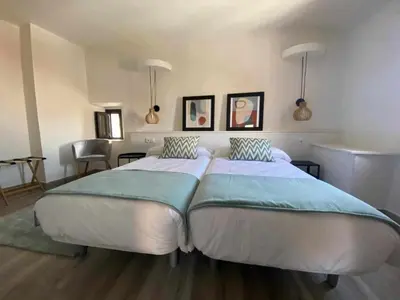 Cama o camas de una habitación en Torre del Postigo By KubiK