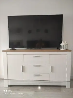 Una televisión o centro de entretenimiento en Apartamentos NayDa studio 1