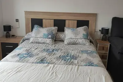 Cama o camas de una habitación en Apartamentos NayDa Studio 2
