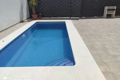 Piscina en o cerca de Apartamentos NayDa Gran casa con piscina