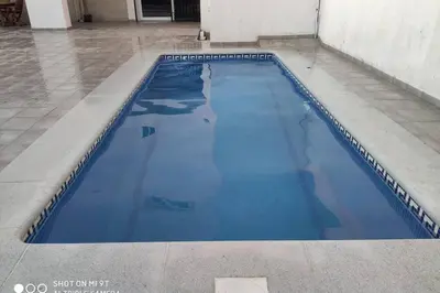 Piscina en o cerca de Apartamentos NayDa Gran casa con piscina