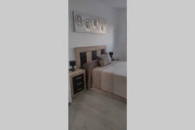 Cama o camas de una habitación en Apartamentos NayDa 2 habitaciones