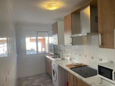 Una cocina o zona de cocina en VUT LA TABERNA I