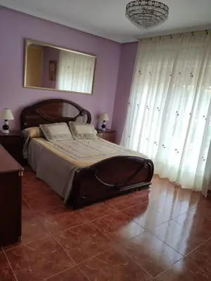 Cama o camas de una habitación en CASA LOS ABUELOS