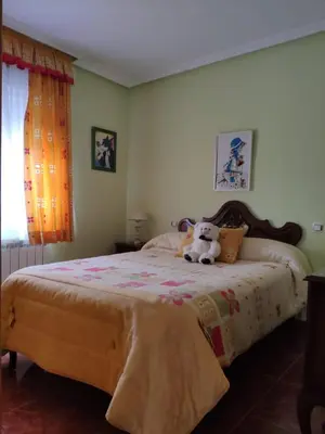 Cama o camas de una habitación en CASA LOS ABUELOS