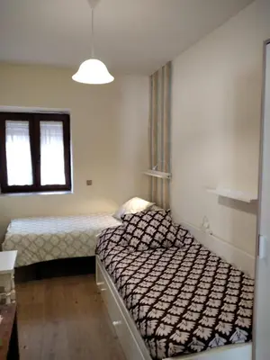 Cama o camas de una habitación en CASA DE VACACIONES EL NARANJO