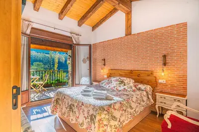 Cama o camas de una habitación en Casa Rural La Chopera del Jerte