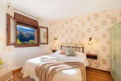 Cama o camas de una habitación en Casa Rural La Chopera del Jerte