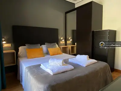 Cama o camas de una habitación en Alojamiento Centro de Salamanca