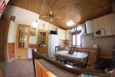 Una cocina o zona de cocina en CASA DE PIEDRA