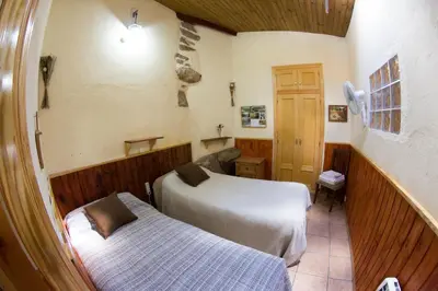 Cama o camas de una habitación en CASA DE PIEDRA