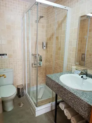 Un baño de Hotel Alma Rosa
