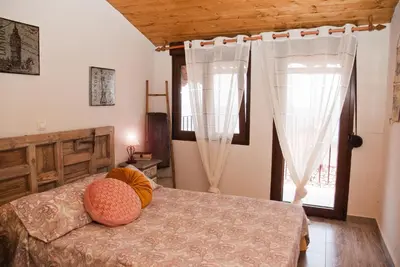 Cama o camas de una habitación en LA CASITA DEL PORTAL
