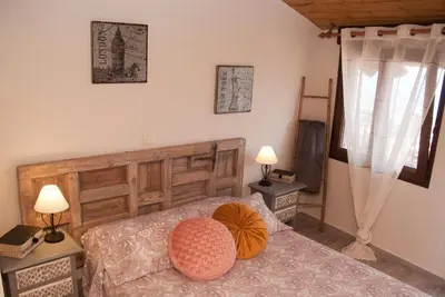 Cama o camas de una habitación en LA CASITA DEL PORTAL