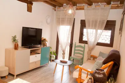 Una televisión o centro de entretenimiento en LA CASITA DEL PORTAL